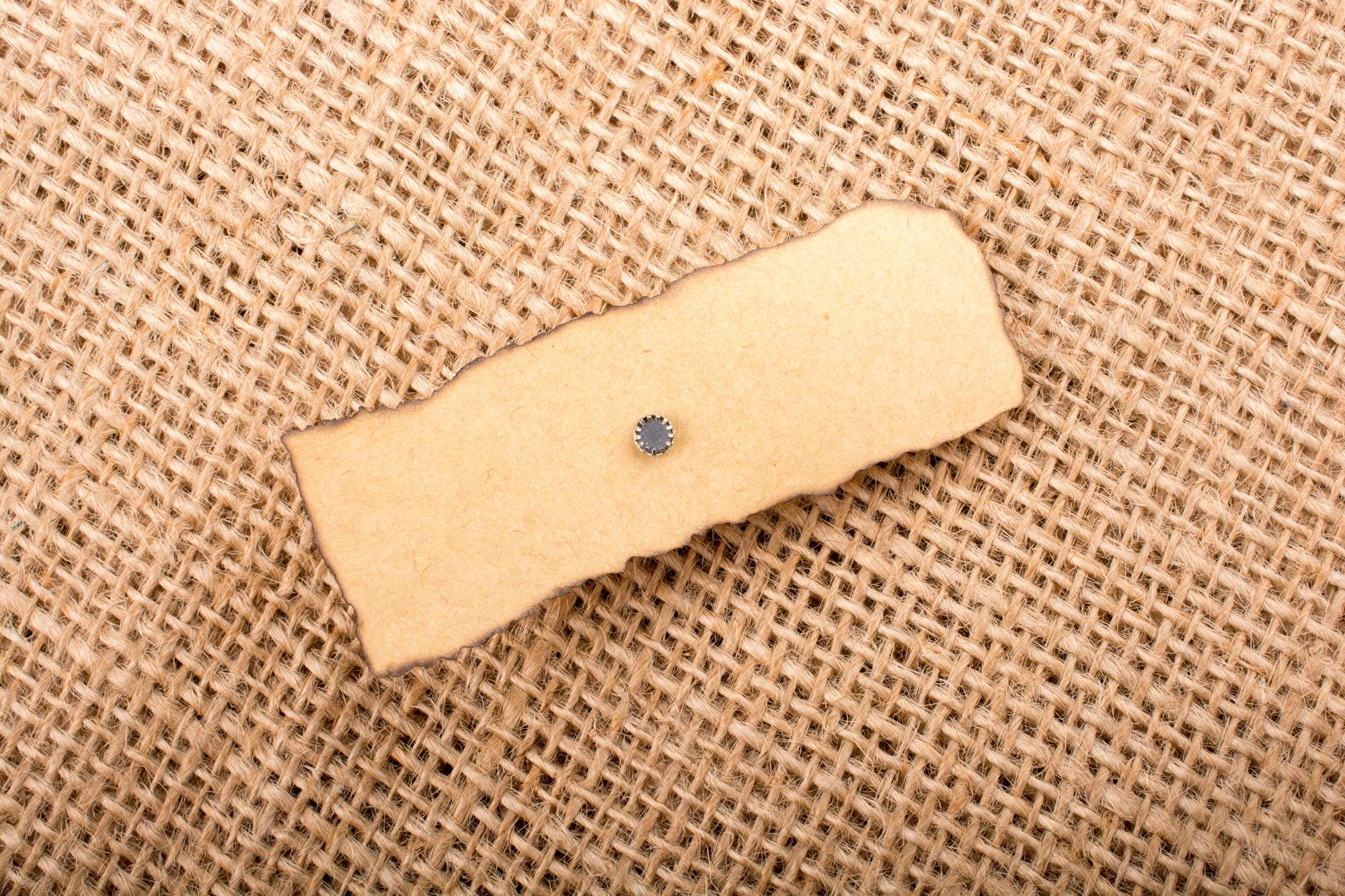 Round embroidered patch on kraft card